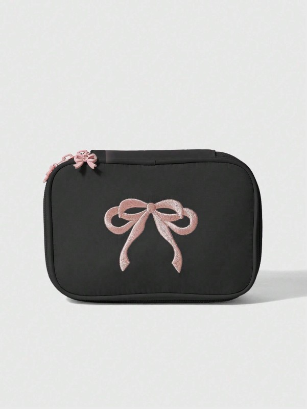 حقيبة مكياج أنيقة بتصميم فيونكة - لحفظ أدوات جمالكِ بأناقة